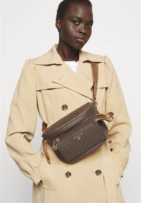 michael michael kors slater sling pack|belt bag michael kors outlet.